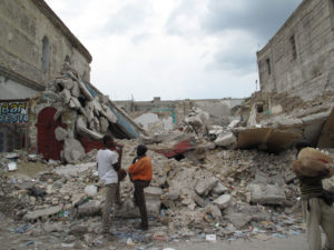 Haiti's earthquake devastated communities. Four months after the earthquake, the government had still not cleared the rubble.