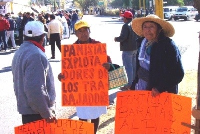 Tlaxcala protesters with signs