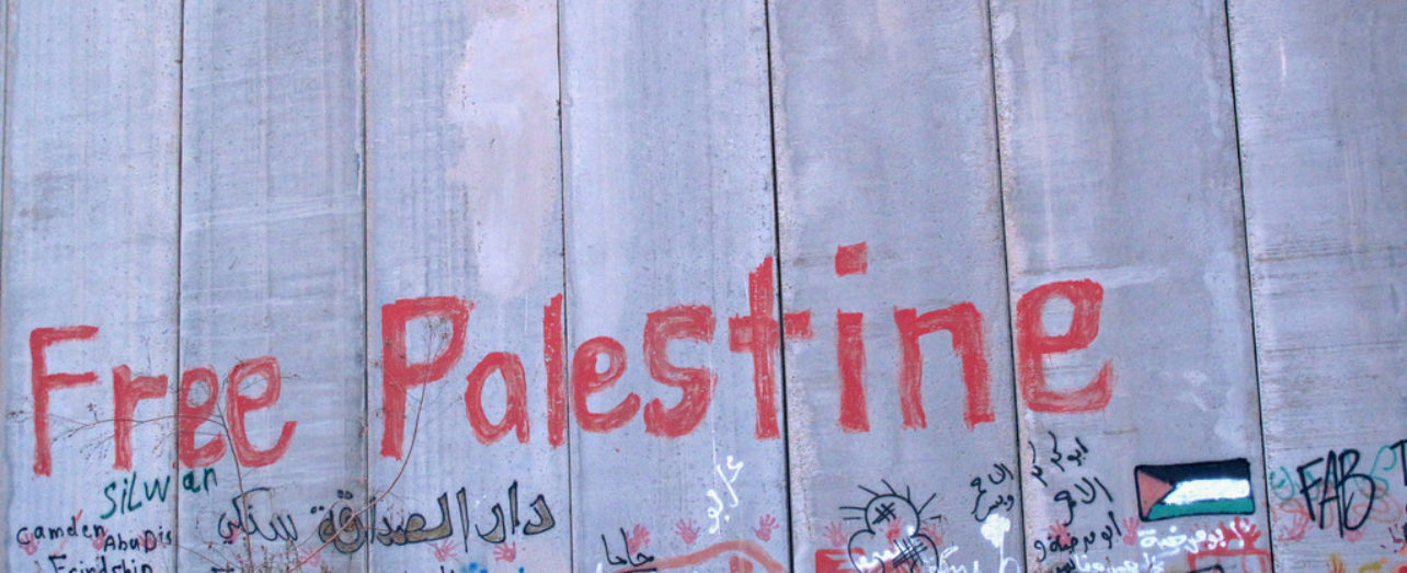 Graffiti reading "Free Palestine" sprayed on the Separation Wall, Palestine.