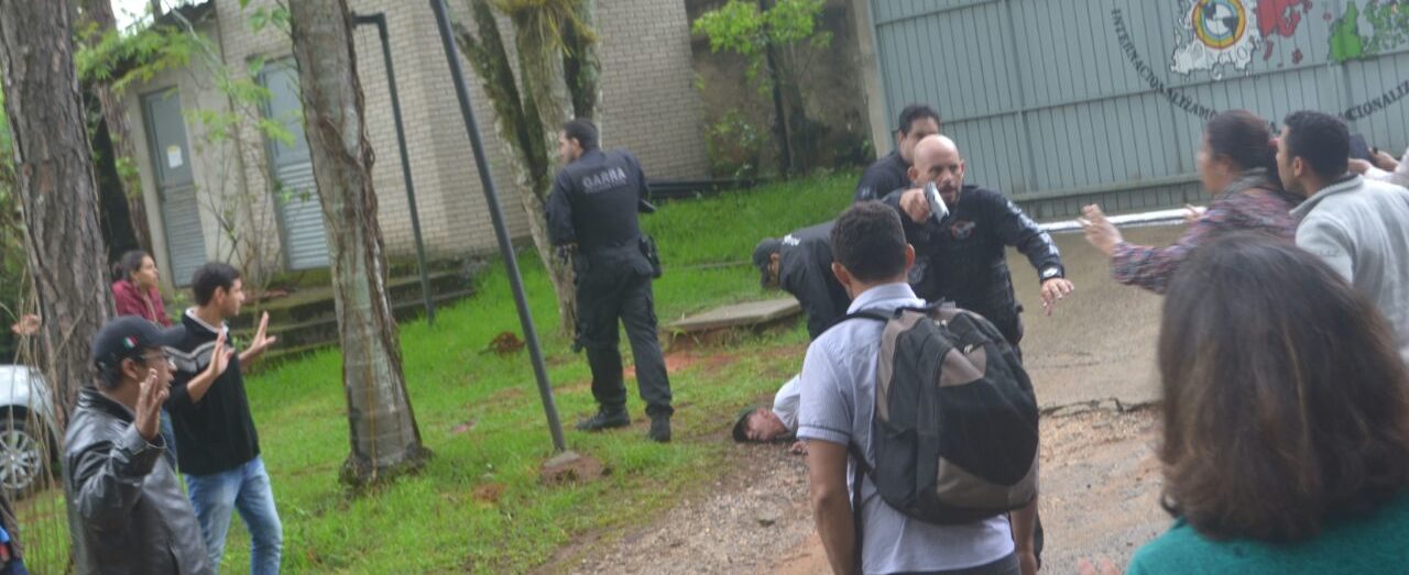 Police drawing guns on students at MST school, Sao Paulo, Brazil.