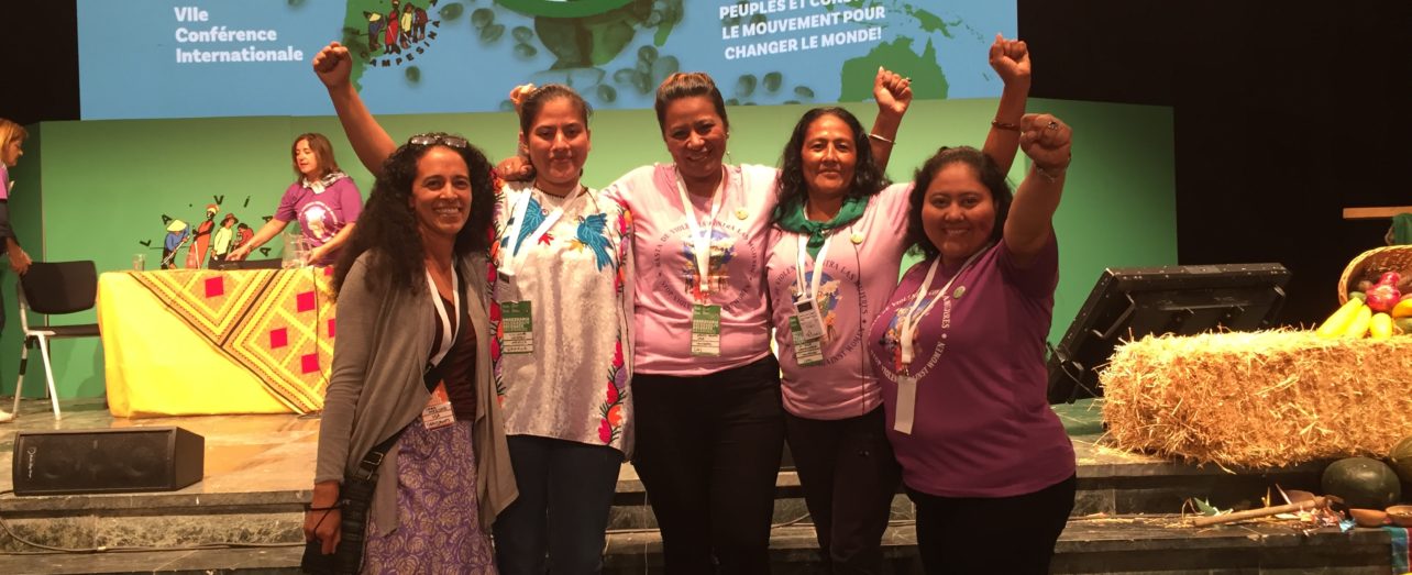 Grassroots' staffer Sara Mersha with members of La Via Campesina.