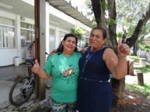Esperanza Cardona with MST member showing her La Via Campesina pride.